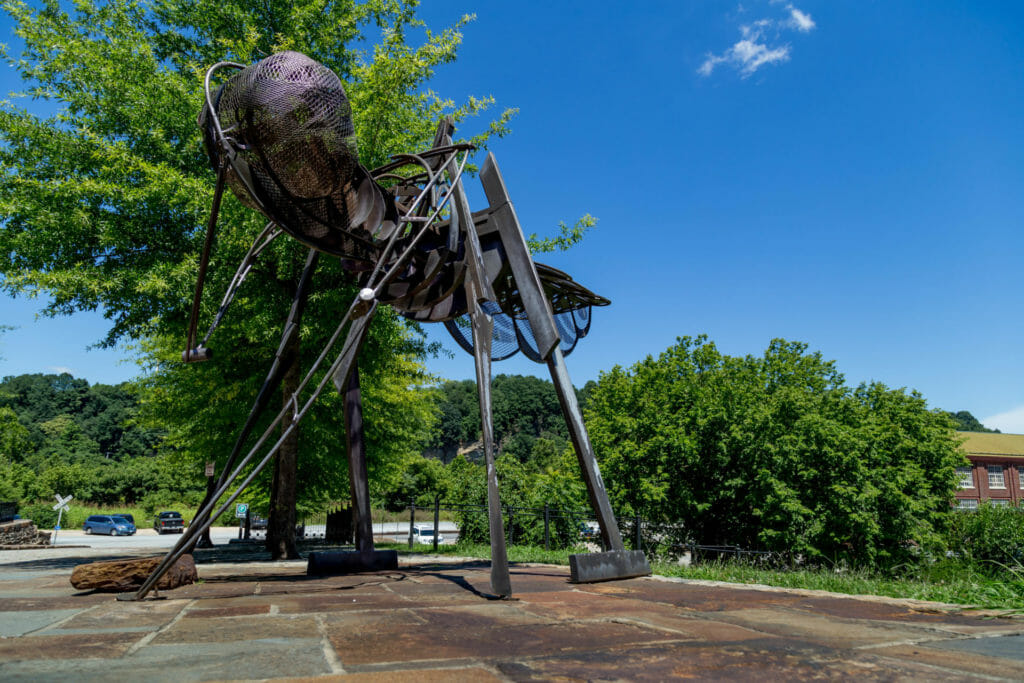 Amazement Square's grasshopper sculpture