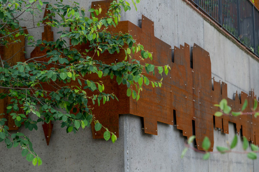 Cityscape wall sculpture by Paul Clements in Lynchburg, VA