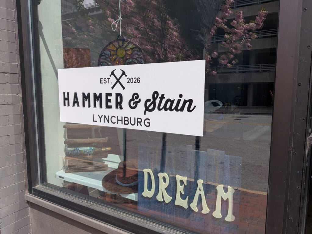 Exterior of Hammer & Stain; window with logo